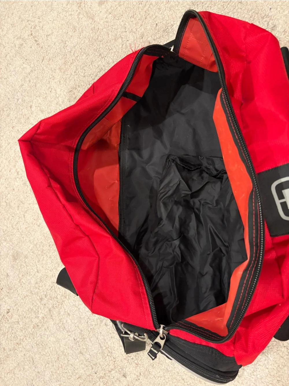 OGIO Red and Black Duffel with Padded Shoulder Strap